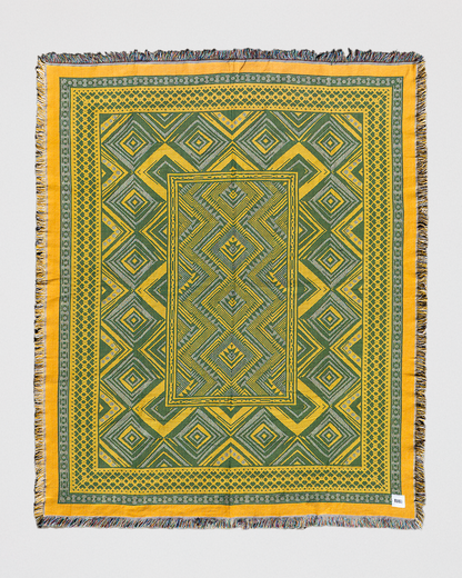 Verdant Haze woven picnic throw in green and yellow, made from 100% recycled cotton